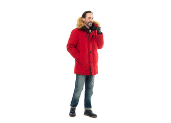 positive man wear warm winter outwear in studio. mature man in red puffer coat outwear. © be free