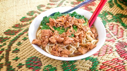 Traditional chicken noodle street food in Indonesia