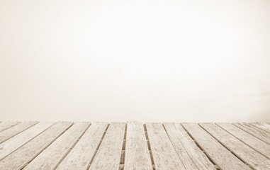 Wooden terrace the blurred and Christmas background concept. Wood white table top perspective in front of natural in the sky with light and mountain blur background image for product display montage.