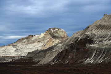 Interesting traces on coal made by the excavator during its operation. Visible result of excavator digging.	