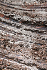 Interesting traces on coal made by the excavator during its operation. Visible result of excavator digging.	