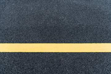 Fototapeta premium Asphalt road with yellow line