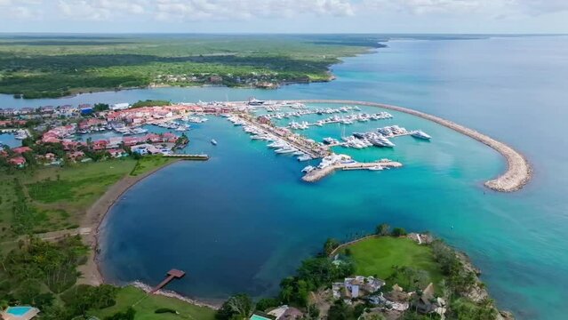 Aerial View Of Casa de Campo Marina, Chavon River, And Calm Blue Waters Of Caribbean Sea In La Romana, Dominican Republic.