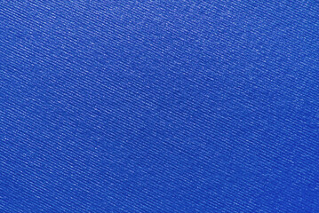 Blue ribbed colored craft paper texture with glitter effect