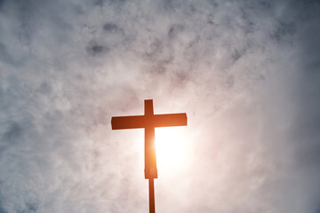 A cross under the dark sky