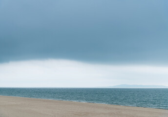 Dark cloudy sky above the sea