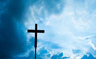 A cross under the blue sky