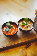 Ajvar and hummus in bowls