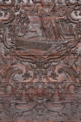 Oviedo (Spain). Architectural detail of the engraving of the wooden gate in the portico of the main façade of the Cathedral of Oviedo
