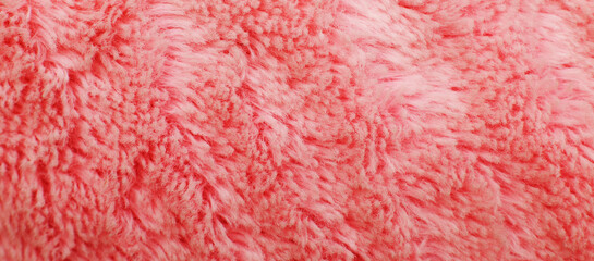 pink fluffy textile texture. Nappy hairy background closeup.