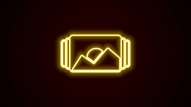 Glowing neon line Photo frame icon isolated on black background. Vintage empty photos frame. 4K Video motion graphic animation