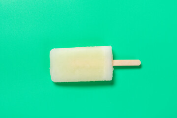 top view fresh phyllanthus emblica flavor popsicle on green backgorund