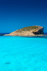 Fototapeta premium Amazing crystal clear water in the Blue Lagoon of Comino Island, Malta