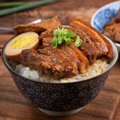 Braised pork belly over cooked rice, famous and delicious street food in Taiwan.
