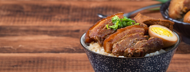Braised pork belly over cooked rice, famous and delicious street food in Taiwan.