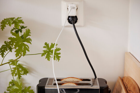 Toaster plugged into an outlet