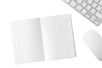 Blank notebook, white keyboard and white mouse