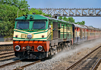 Indian Railway's prestigious, luxurious Rajdhani express passing through a small station, Kudal.