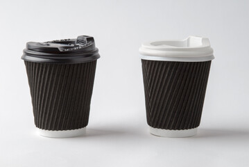 Empty paper cups with plastic lid isolated