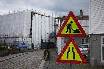 Road signs, building in background