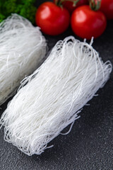 glass noodles raw rice noodles funchose asian food meal snack on the table copy space food background rustic top view