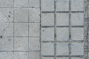 Obraz premium Rough cement surface of a walkway as a textured background