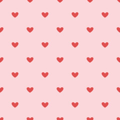 Vector valentines day seamless pattern with red hearts on pink background