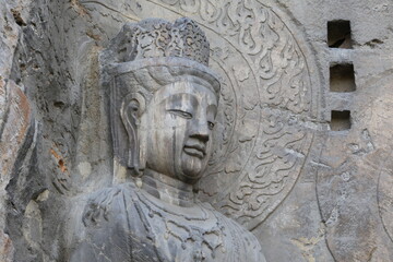 Fototapeta na wymiar Buddha In Fengxian Temple The Biggest Cave Of Longmen Grottoes Luoyang Henan China