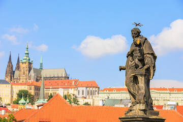 Ancient medieval sculptures on the Charles Bridge. Background with selective focus