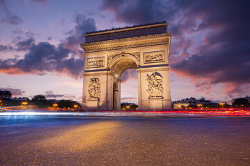 Arc de Triomphe(Arch of Triumph) Paris city at sunset. Long exposure panorama