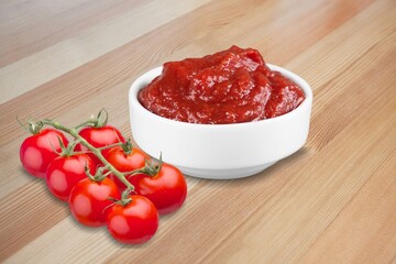 Ripe tasty fresh tomatoes and sauce.