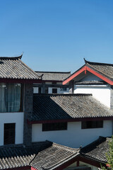 Fototapeta na wymiar Chinese style roof under blue sky