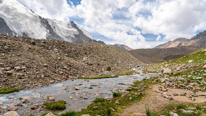 Fototapeta na wymiar a river in a mountain valley. a mountain river runs through the gorge
