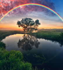 Landscape with a Rainbow on the River in Spring. colorful morning. nature of Ukraine
