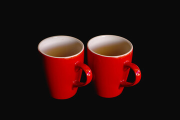 two cups of coffee on lack background