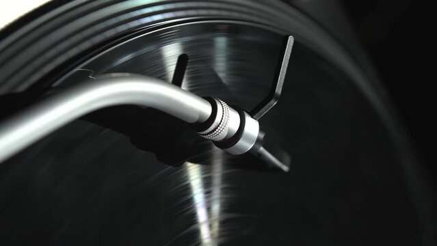 Turntables needle playing vinyl record with music. Vertical stock video clip of turn table player in close up