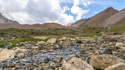 a river in a mountain valley. a mountain river runs through the gorge