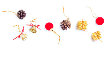 Christmas and New year decorations, Gift box, Pine cones, Golden bell and Red decoration christmas ball on white background
