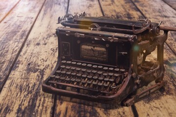 Fototapeta na wymiar A vintage retro typewriter for writing on desk