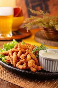 Tiras de frango frito