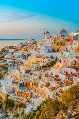 Obraz premium lights of Oia village at blue night lose up, Santorini Greece, toned
