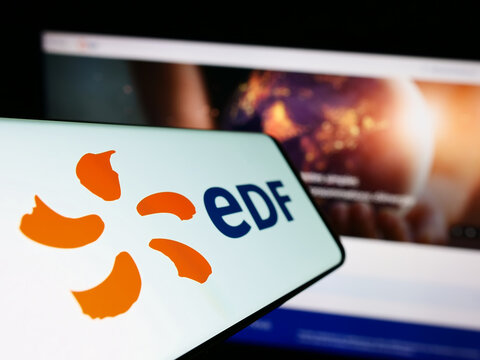 Stuttgart, Germany - 12-01-2022: Smartphone with logo of energy company Electricite de France S.A. (EDF) on screen in front of website. Focus on center-left of phone display.