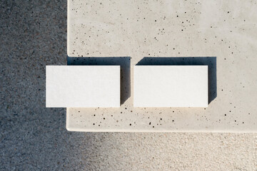 Blank business cards on a concrete background 