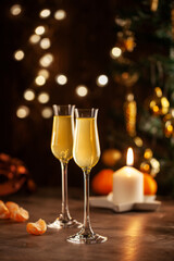 Mandarin liqueur for Christmas. Festive concept. Mimosa cocktail