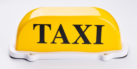 Yellow taxi sign for car roof isolated on white background