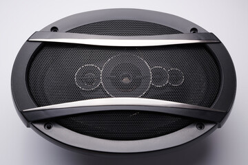 Black car sound speakers close-up on a white background, audio system, hard bass subwoofer