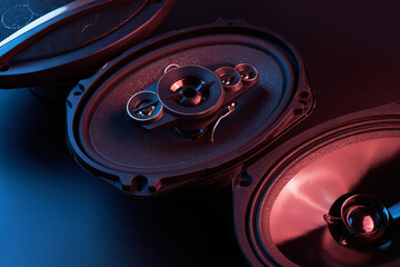 Black car sound speakers close-up on a black background, audio system, hard bass subwoofer