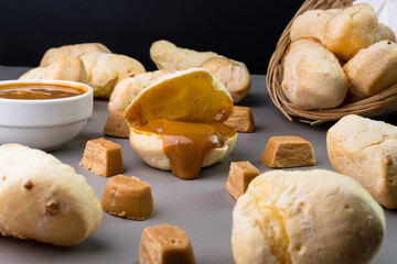 Brazilian Pão de queijo, fresh cheese bread stuffed with dulce de leche. Selective focus