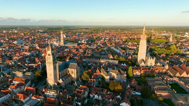 Aerial of Belfry of Bruges is a medieval bell tower in the centre of Bruges Belgium. 4k