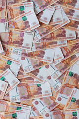 Money background. Banknotes of Russian rubles. Russian money with a face value of five thousand rubles. The concept of Finance. Cash loan. Top view, flat lay.
